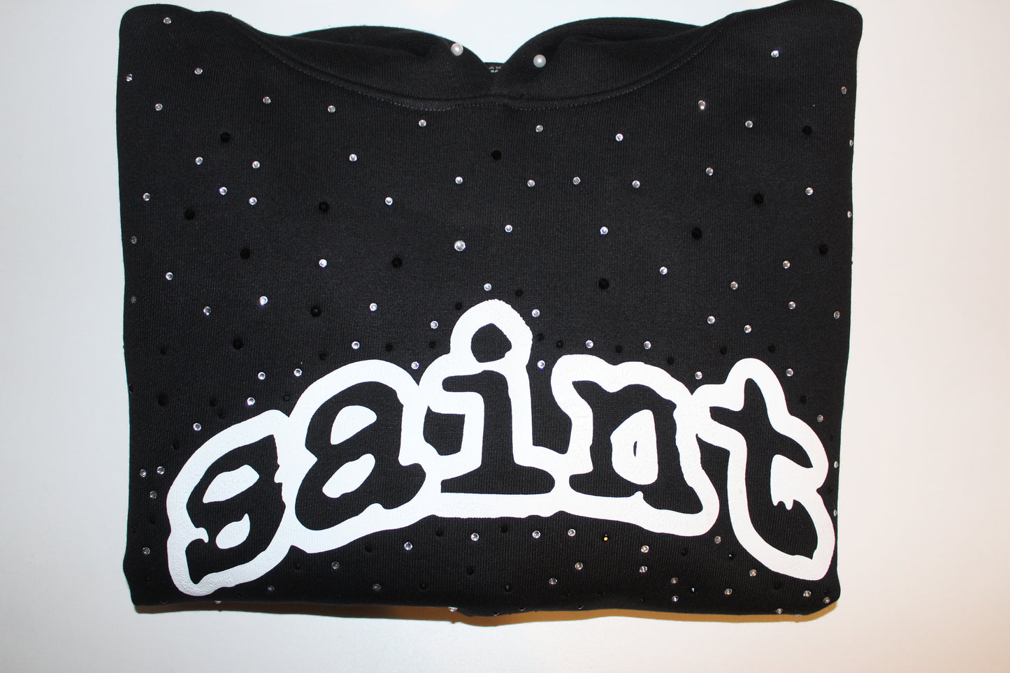 “saint” rhinestone pullover